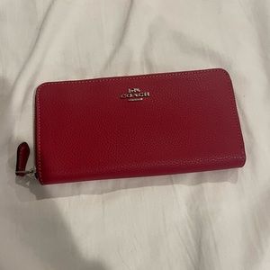 Large coach wallet. Dark pink.
